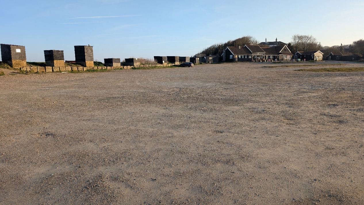 Beach car park with winches and Flora Tea Rooms